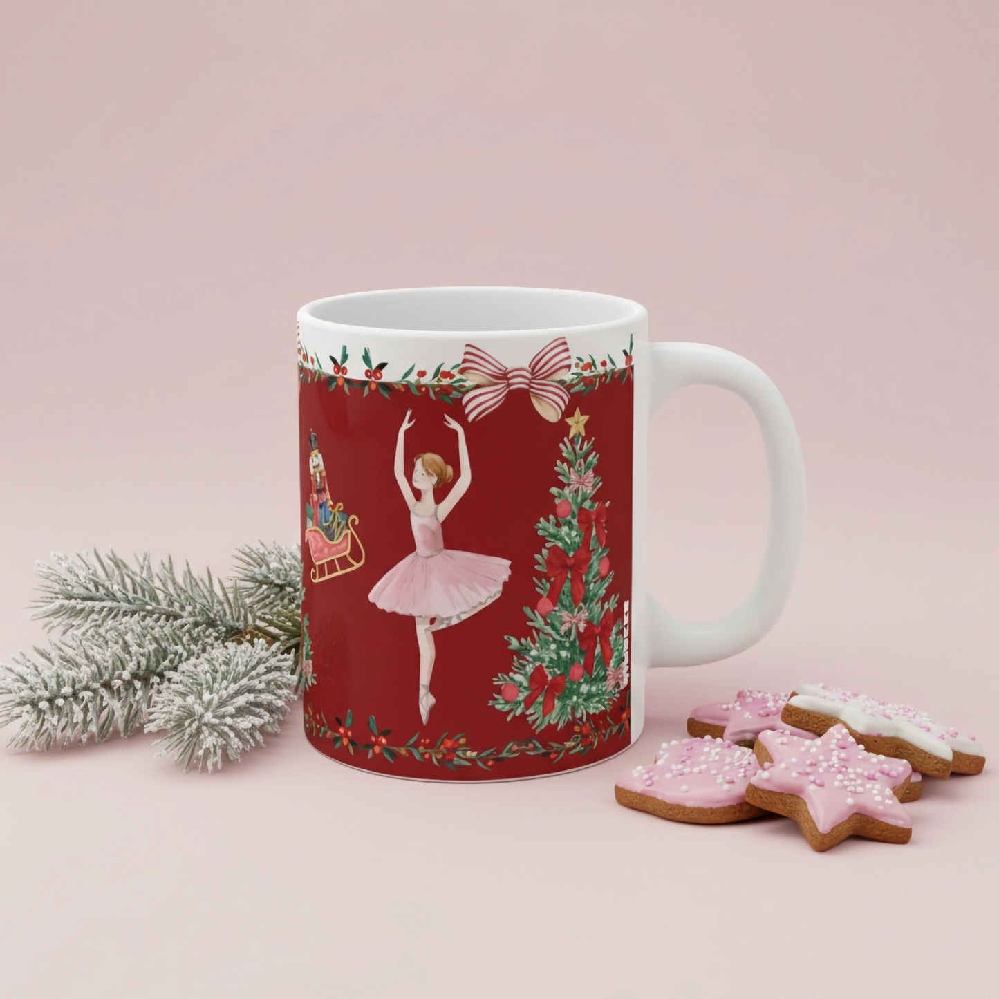 Mug with Christmas design featuring a ballerina, tree, and cookies on a pink background