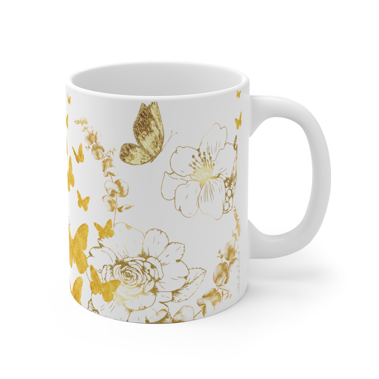 Goldfarbene Keramiktasse mit Blumenmuster und Schmetterlingen