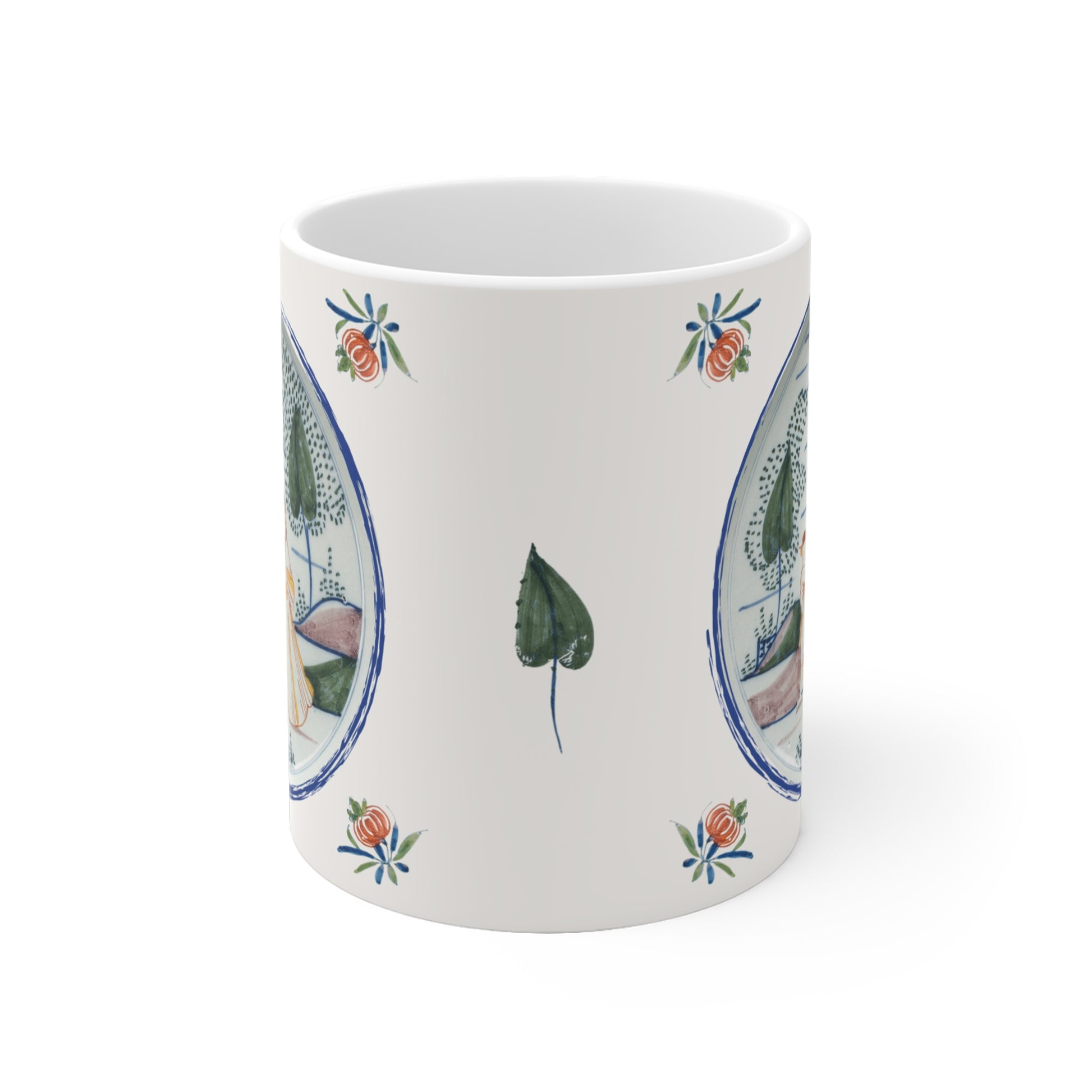 Coffee mug with floral and leaf patterns inspired by Delft Blue